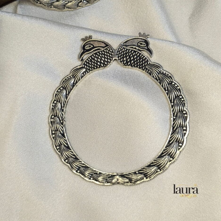 German silver bangle with peacock design