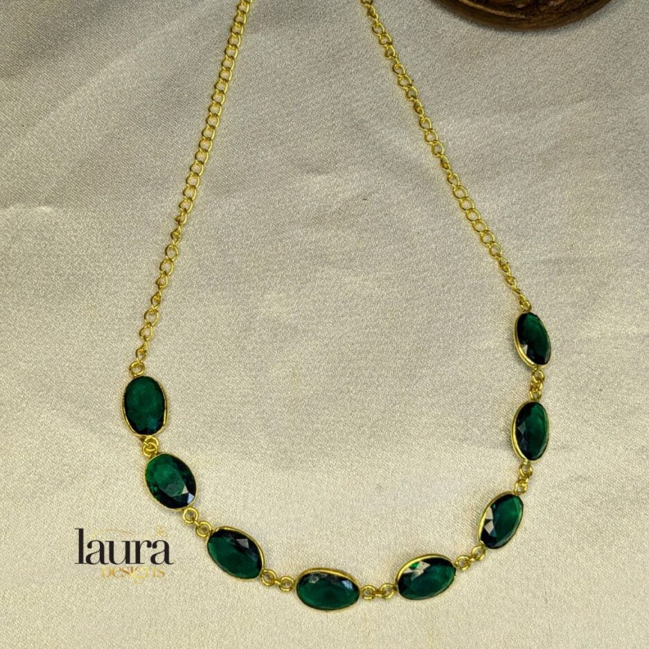 Green stone neckpiece with gold polish