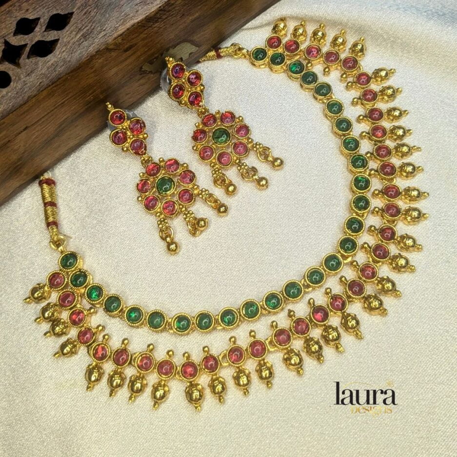 Traditional gold polished pink and green necklace set