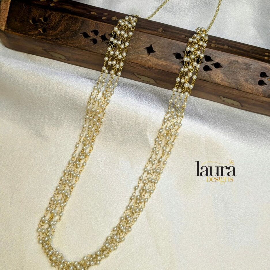 white pearl layered necklace