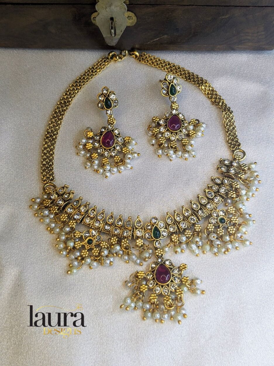 golden necklace and earring set