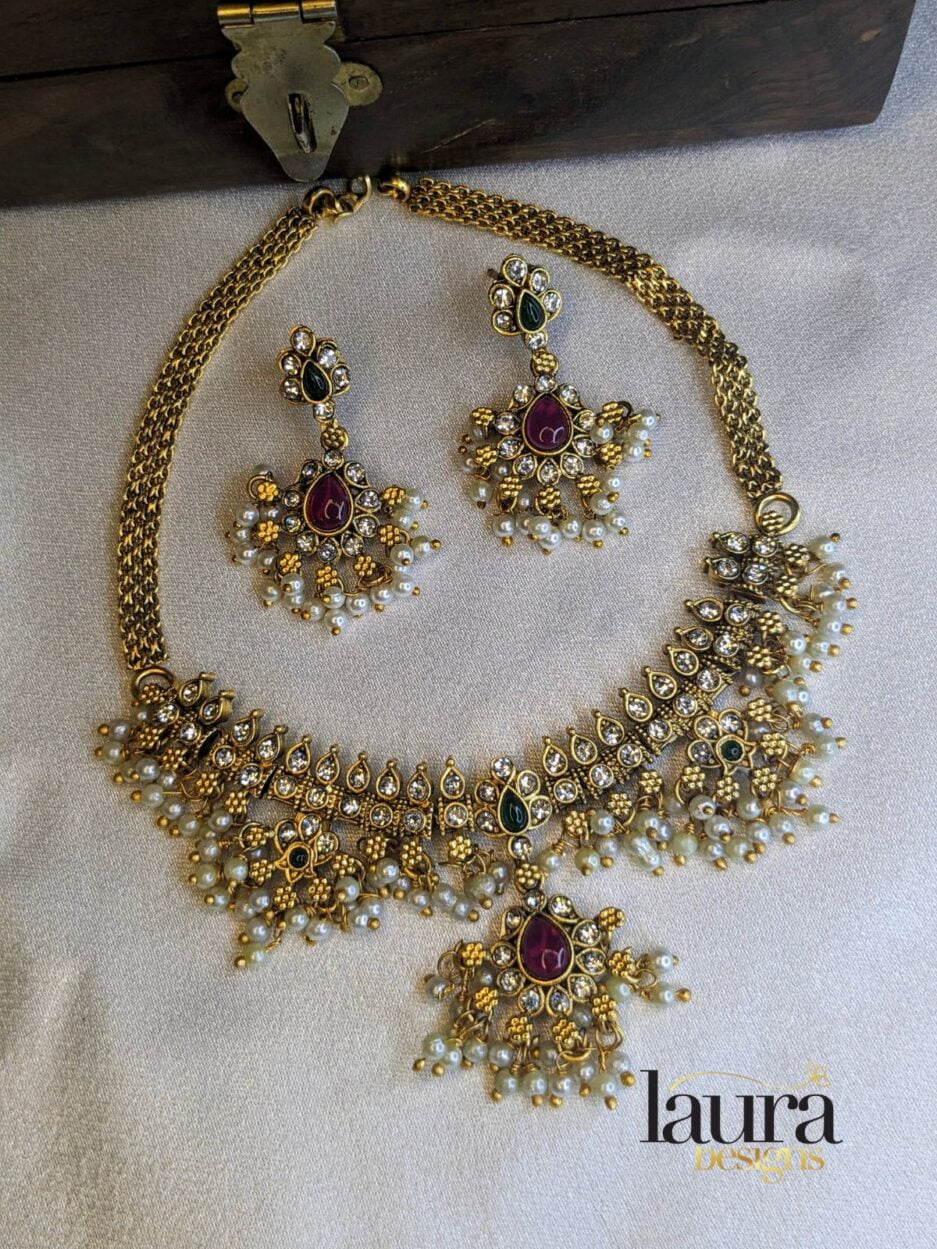 golden necklace and earring set
