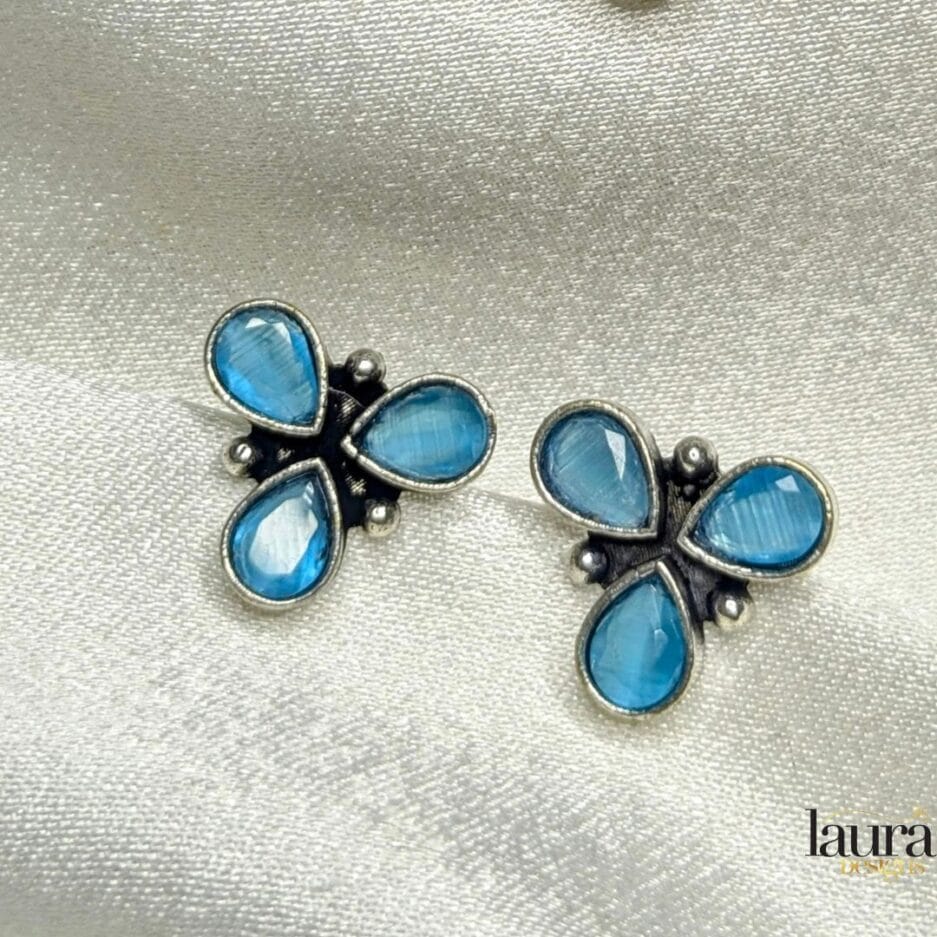 light blue studs