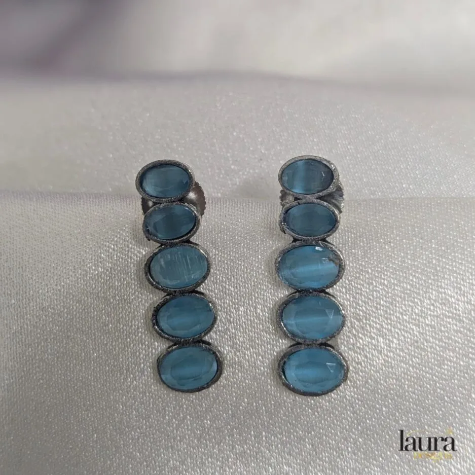 light blue studs